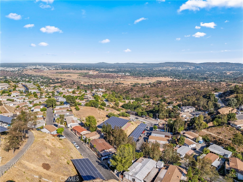 24425 Woolsey Canyon Road, Unit 196 West Hills, CA 91304 - Photo 16 of 29 an aerial view of residential houses with outdoor space