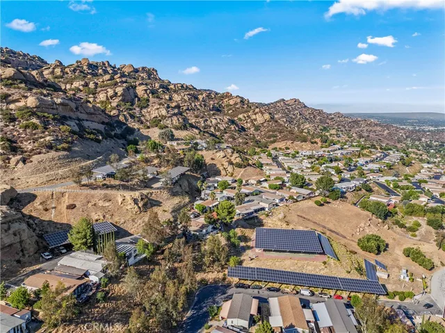 a large kitchen with stainless steel appliances lots of counter space and wooden floor