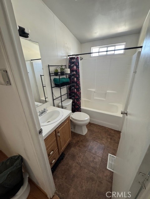 24425 Woolsey Canyon Road, Unit 196 West Hills, CA 91304 - Photo 24 of 29 a bathroom with a sink a toilet and shower