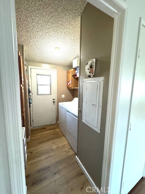 24425 Woolsey Canyon Road, Unit 196 West Hills, CA 91304 - Photo 25 of 29 a room with a washer and dryer