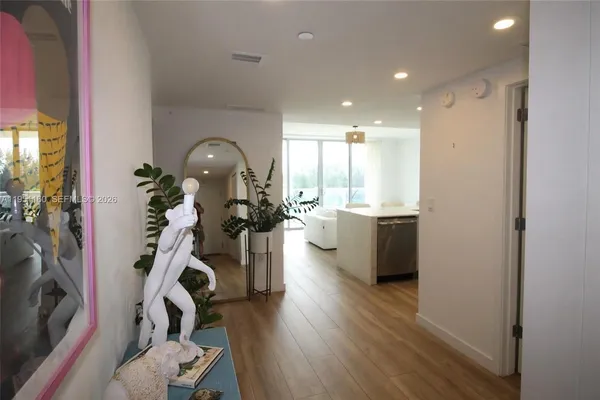 a view of balcony and yard