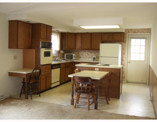 73 Primrose Hill Road Barrington, RI 02806 - Photo 3 of 7 Kitchen. Open Eat-in-Kitchen Opens to Dining Area and Deck