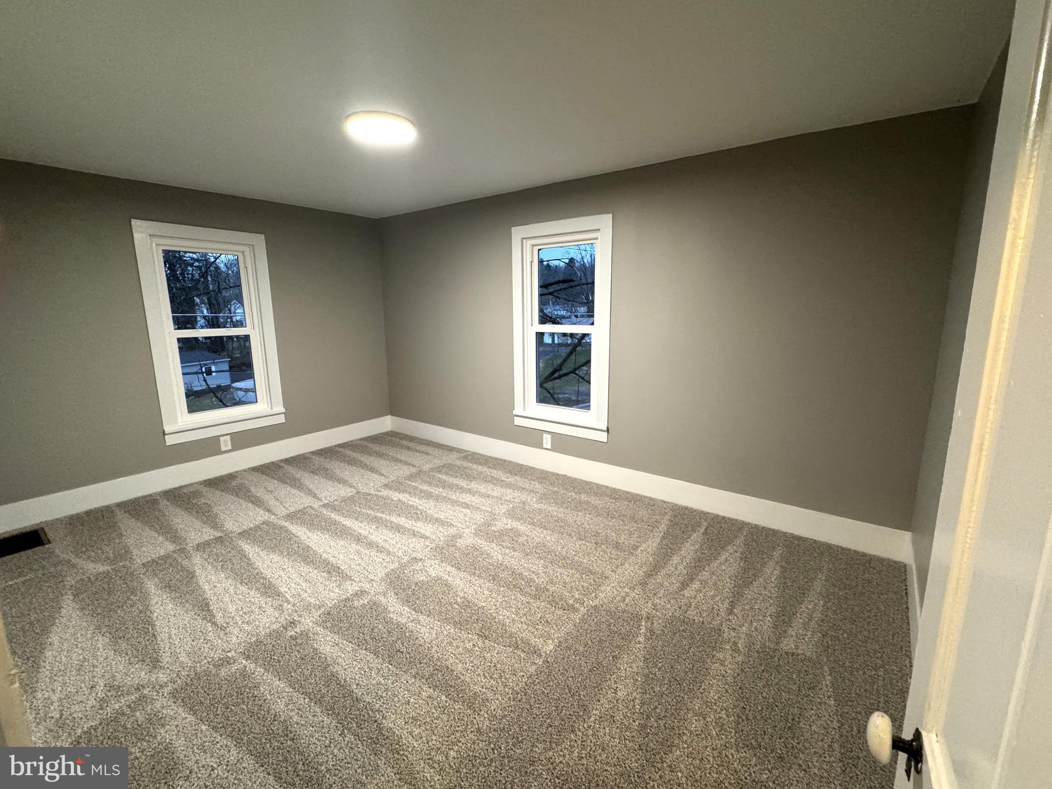 85 Maclay Street Milroy, PA 17063 - Photo 17 of 24 an empty room with windows