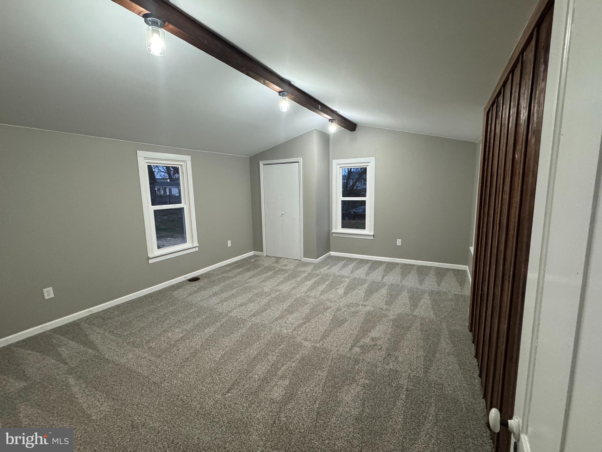 85 Maclay Street Milroy, PA 17063 - Photo 18 of 24 an empty room with windows and closet