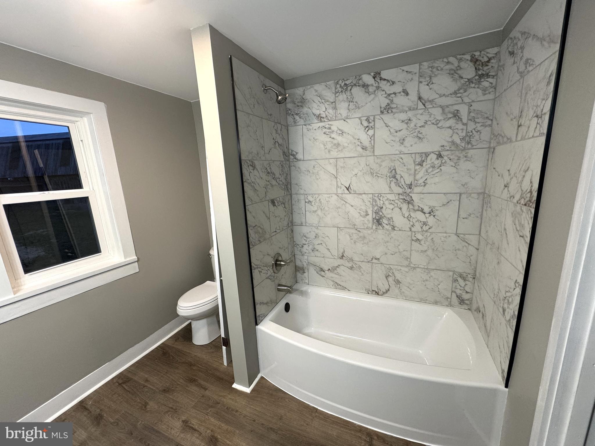 85 Maclay Street Milroy, PA 17063 - Photo 22 of 24 a bathroom with a bathtub and a toilet