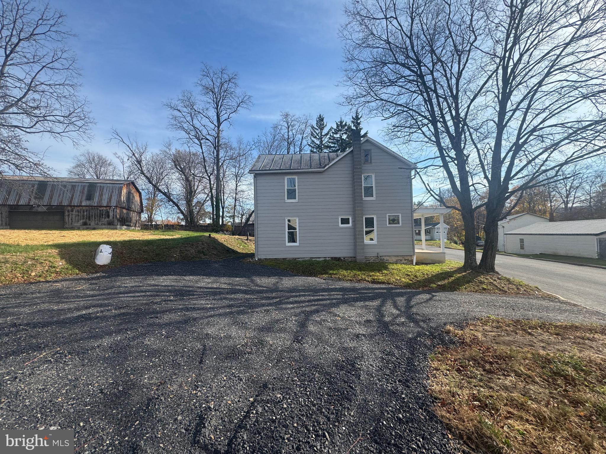 85 Maclay Street Milroy, PA 17063 - Photo 23 of 24 a view of a house with a yard