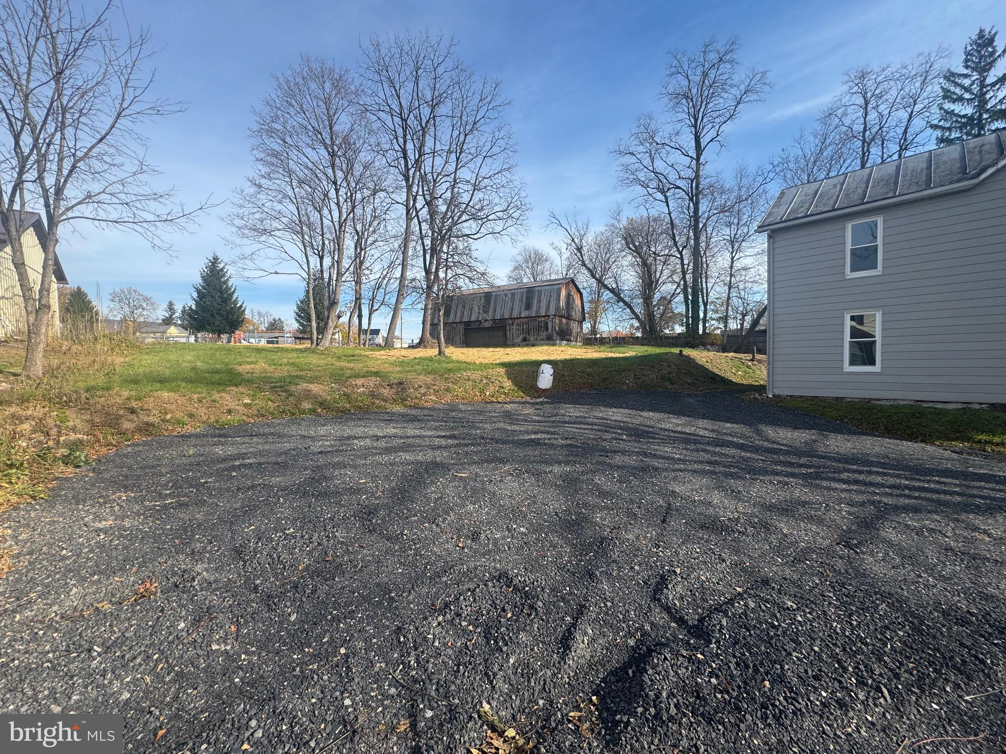 85 Maclay Street Milroy, PA 17063 - Photo 24 of 24 a view of pool with trees in the background