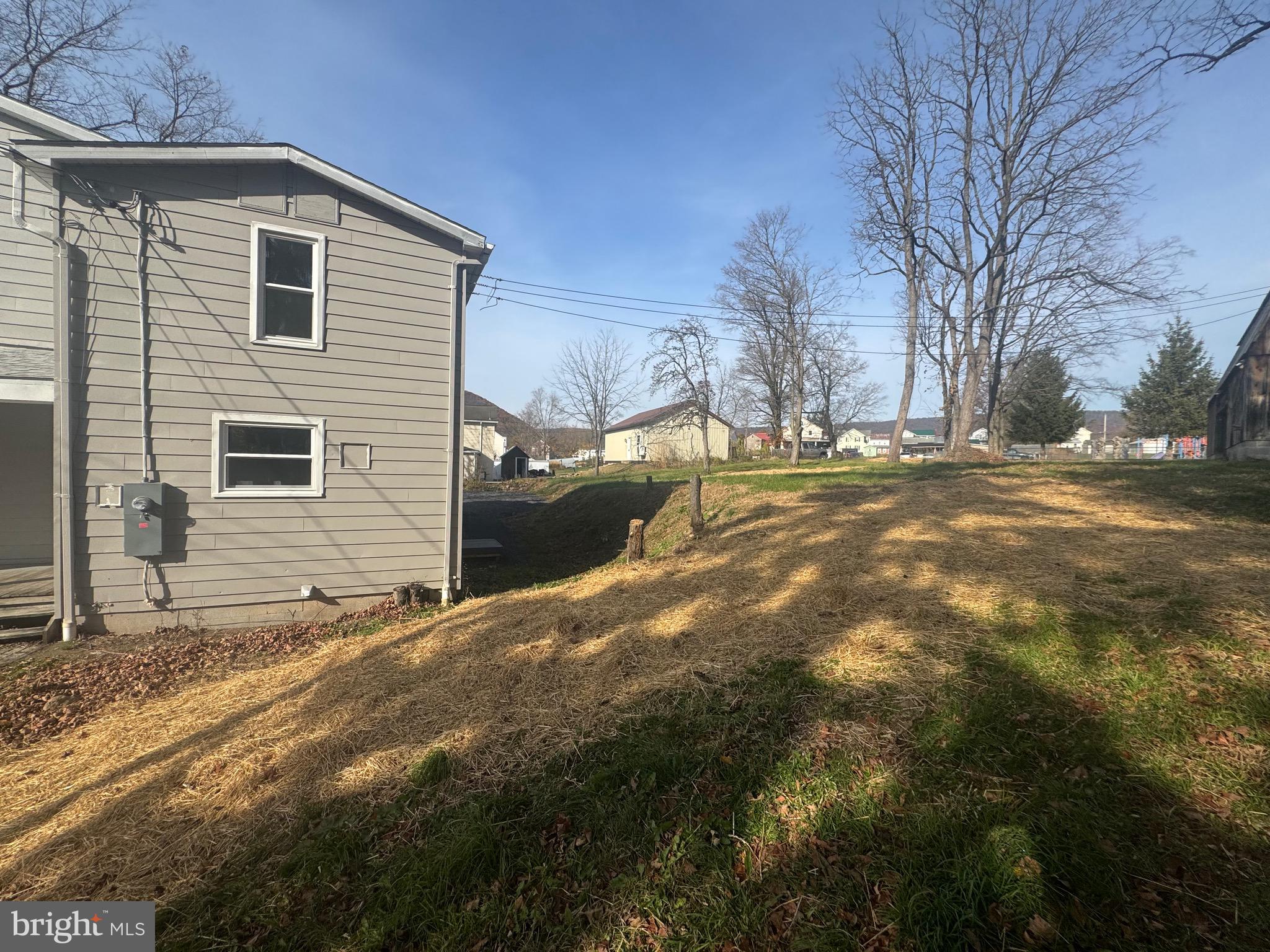 85 Maclay Street Milroy, PA 17063 - Photo 3 of 24 a view of a house with a yard