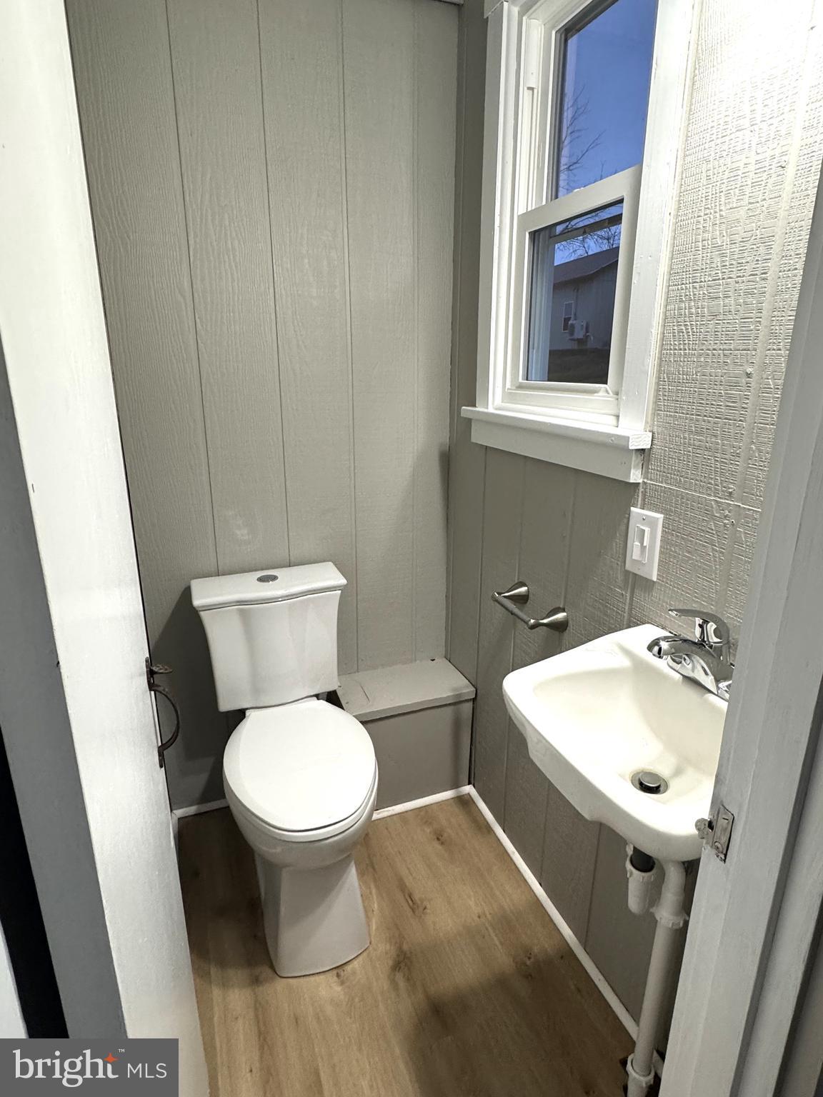 85 Maclay Street Milroy, PA 17063 - Photo 10 of 24 a white toilet sitting next to a bathroom sink