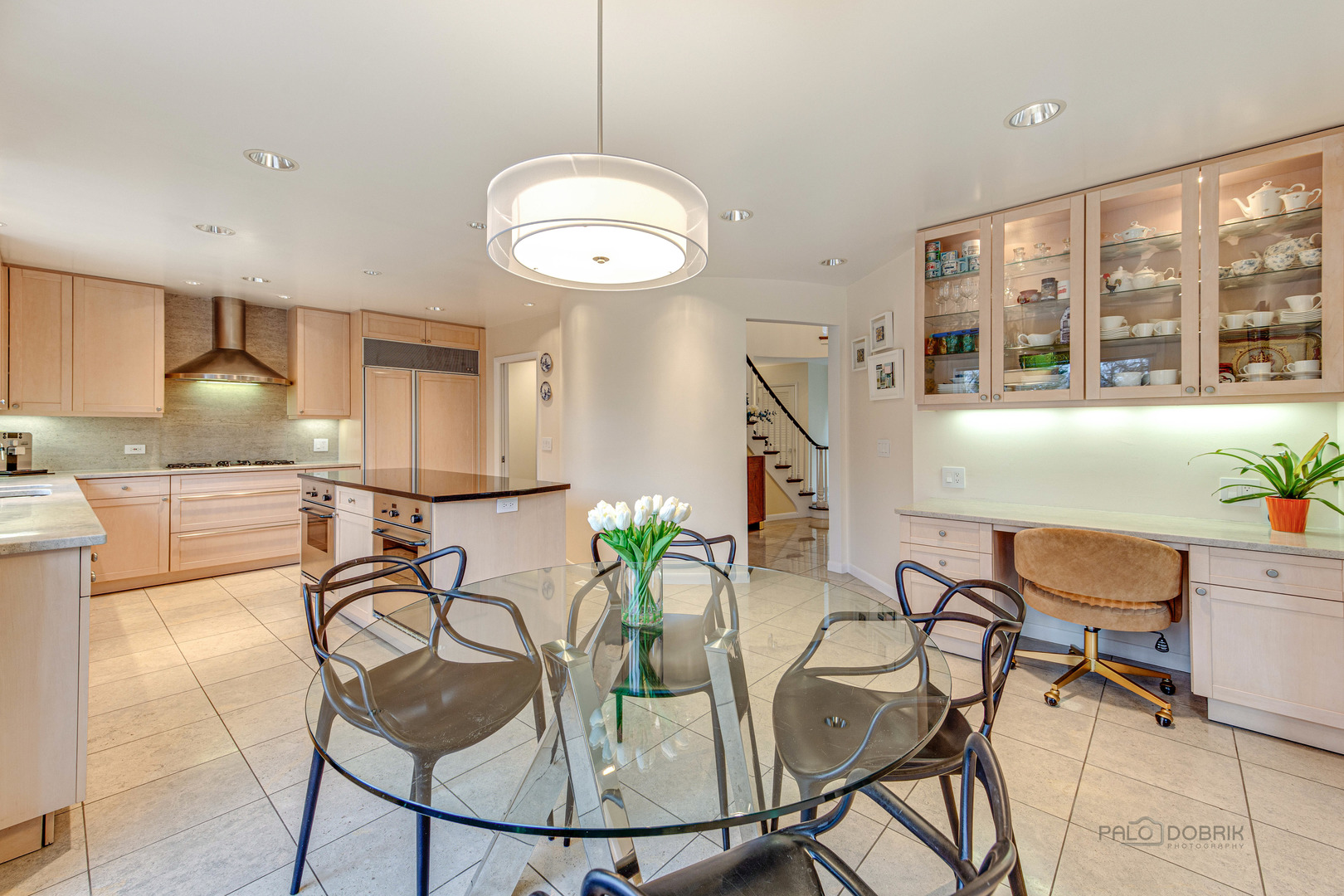 783 Valley Road Glencoe, IL 60022 - Photo 11 of 45 a view of a dining room with furniture wooden floor and chandelier