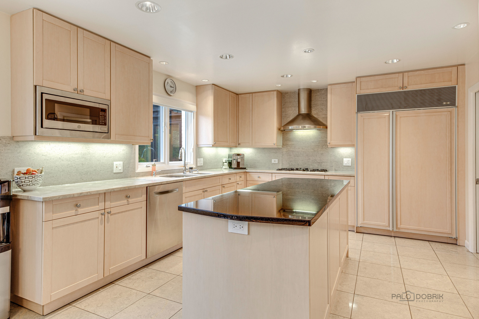 783 Valley Road Glencoe, IL 60022 - Photo 13 of 45 a kitchen with stainless steel appliances granite countertop a sink stove and refrigerator