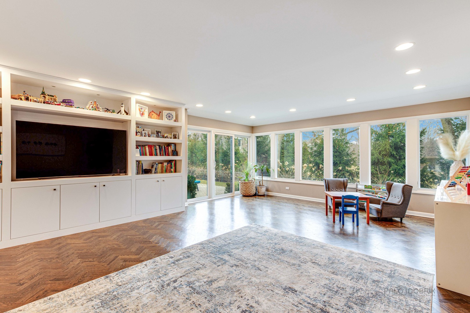 783 Valley Road Glencoe, IL 60022 - Photo 19 of 45 a living room with furniture and a flat screen tv