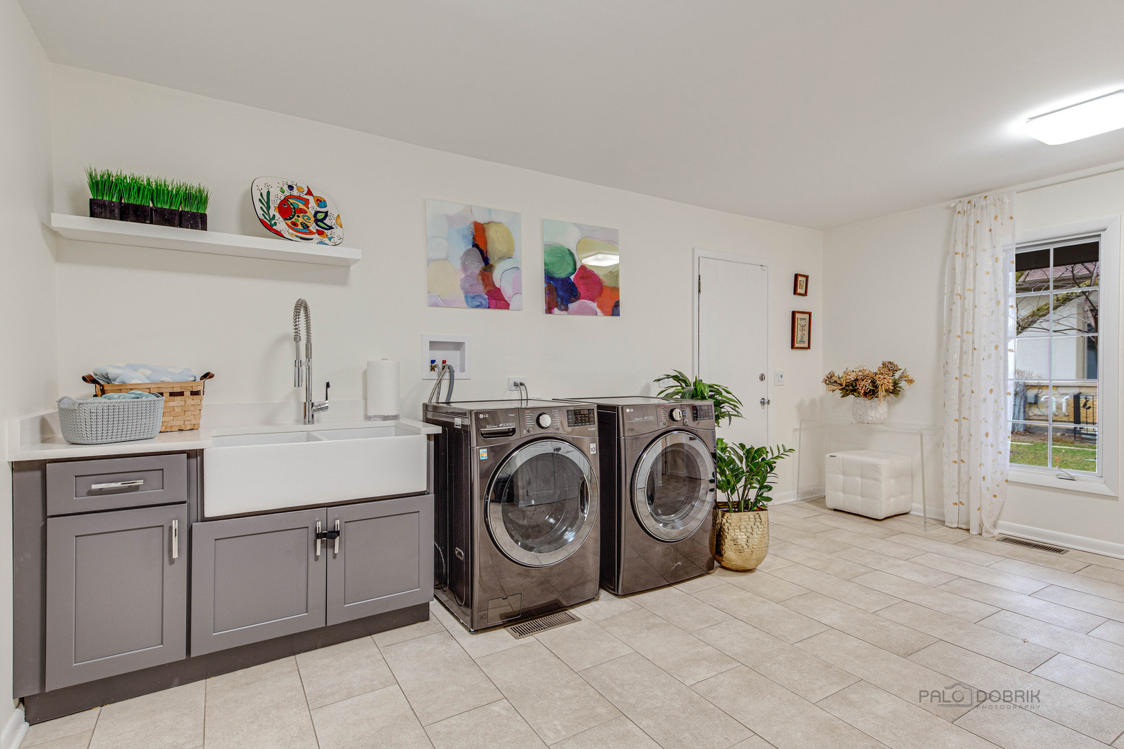 783 Valley Road Glencoe, IL 60022 - Photo 21 of 45 a utility room with sink dryer and washer
