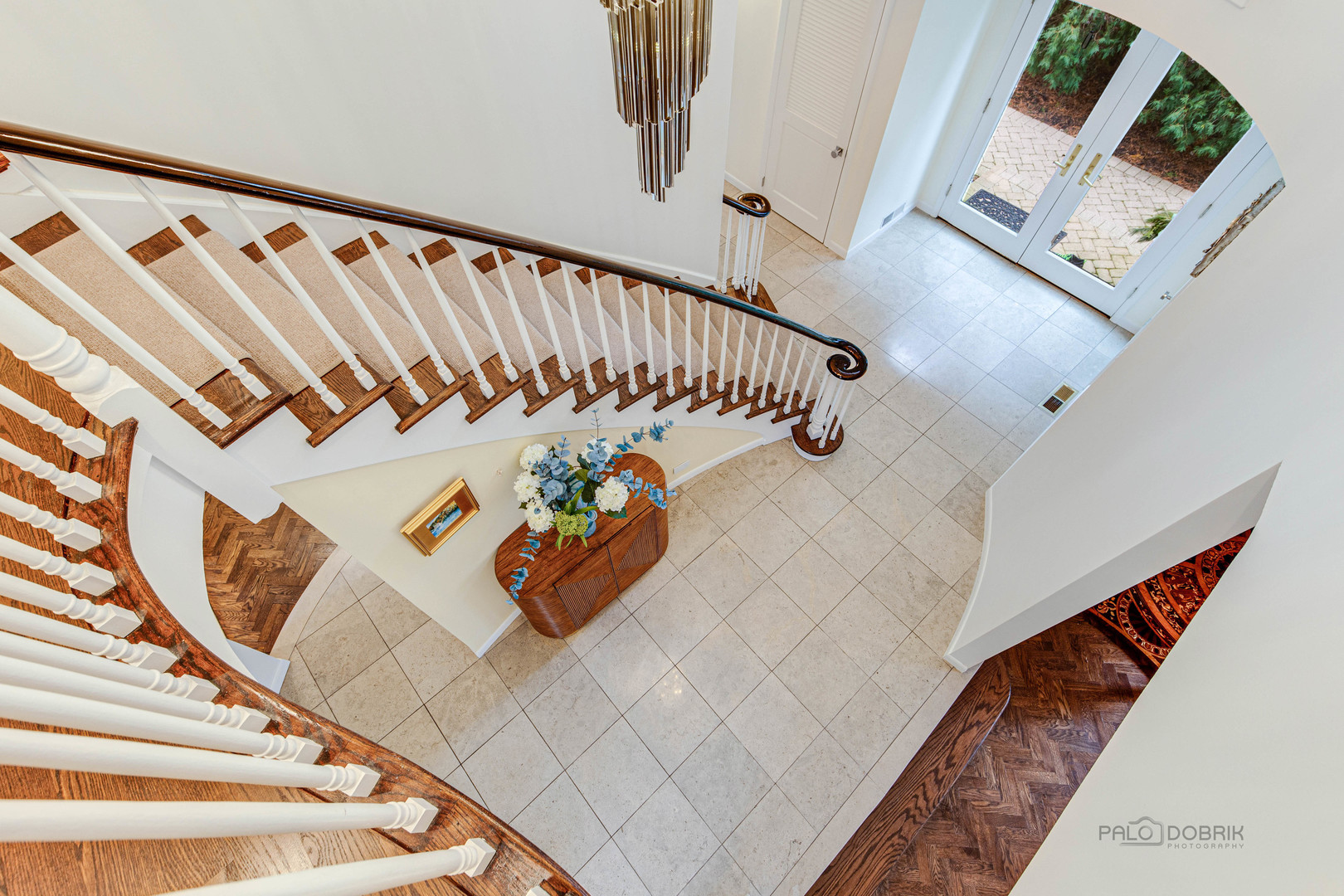 783 Valley Road Glencoe, IL 60022 - Photo 25 of 45 a view of entryway with wooden floor