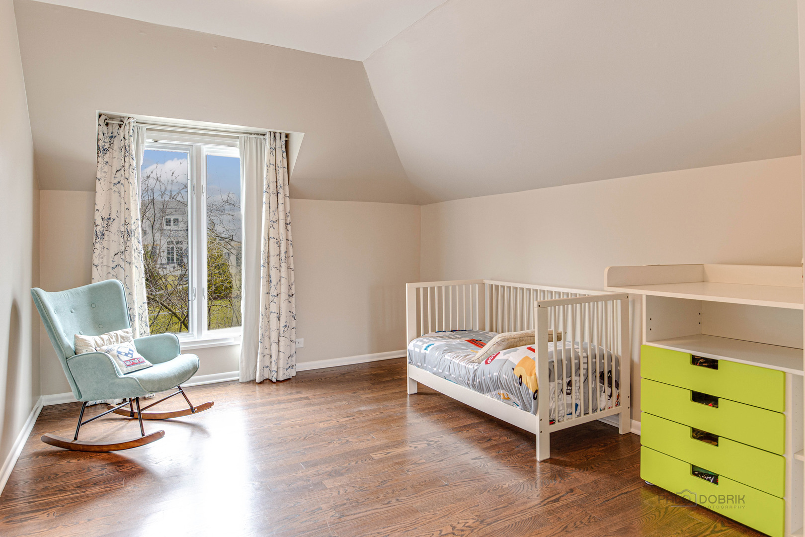 783 Valley Road Glencoe, IL 60022 - Photo 30 of 45 a bedroom with a bed and a window