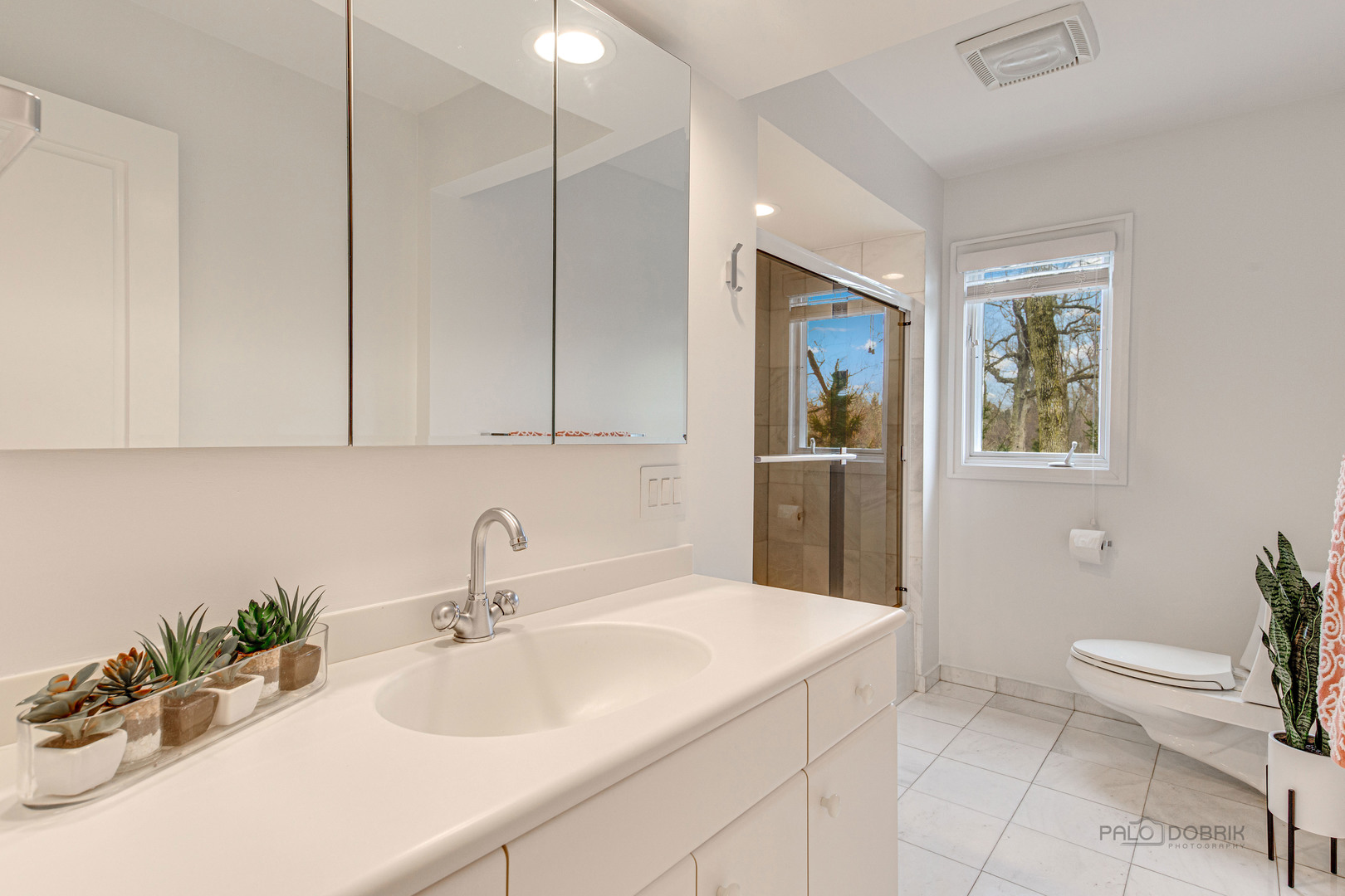 783 Valley Road Glencoe, IL 60022 - Photo 38 of 45 a bathroom with a sink and a toilet