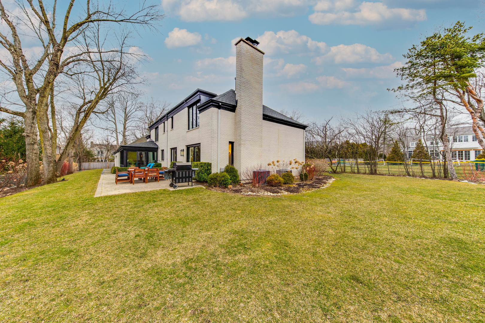783 Valley Road Glencoe, IL 60022 - Photo 45 of 45 a front view of house with yard and trees
