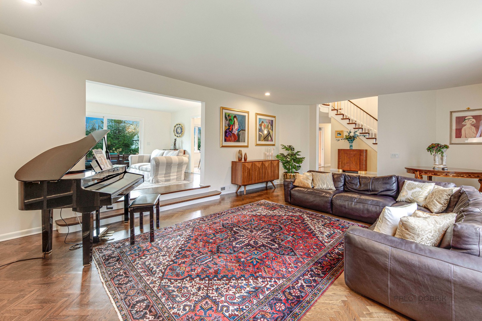 783 Valley Road Glencoe, IL 60022 - Photo 7 of 45 a living room with furniture and a wooden floor