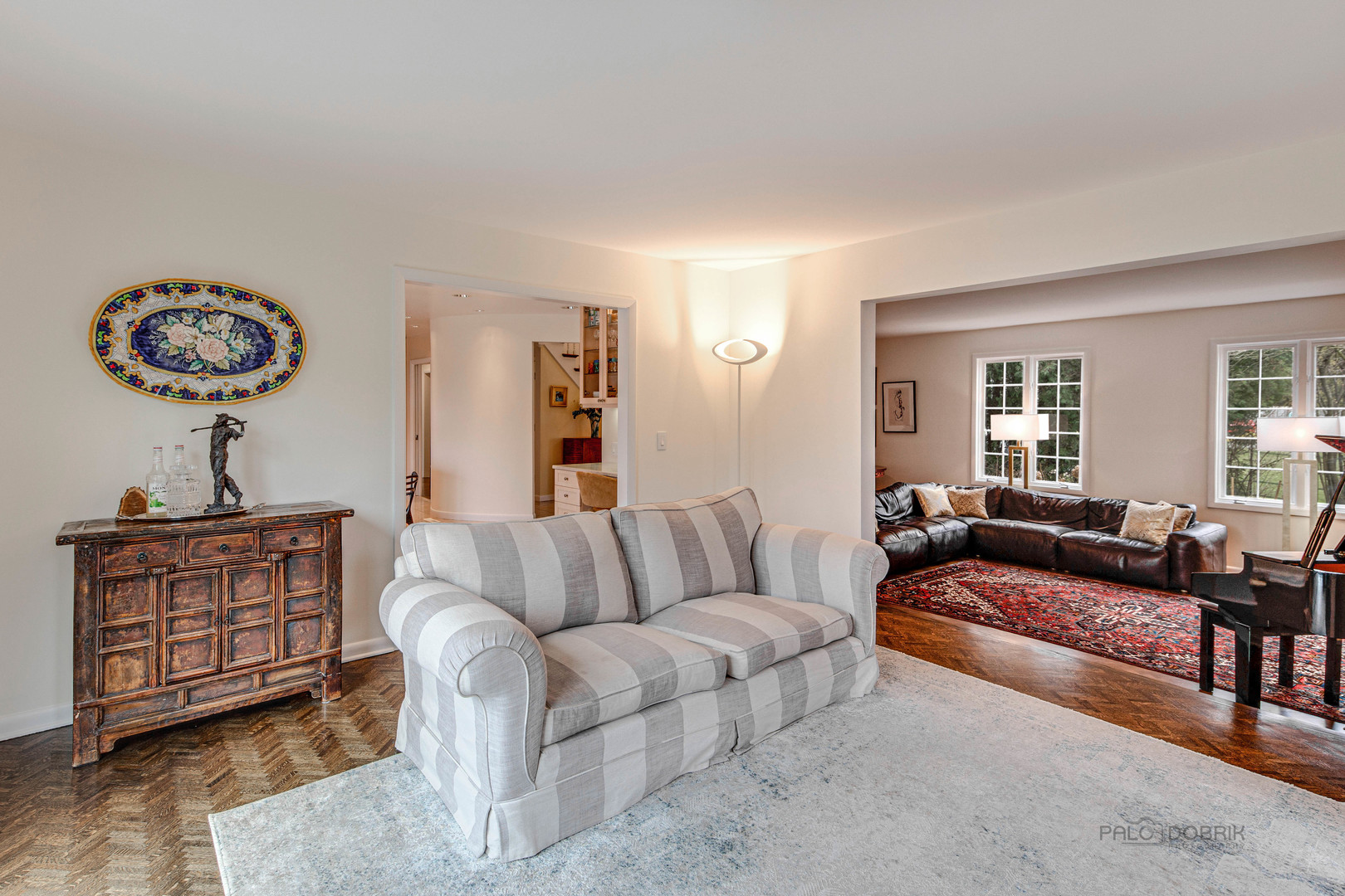 783 Valley Road Glencoe, IL 60022 - Photo 9 of 45 a living room with furniture a couch and wooden floor