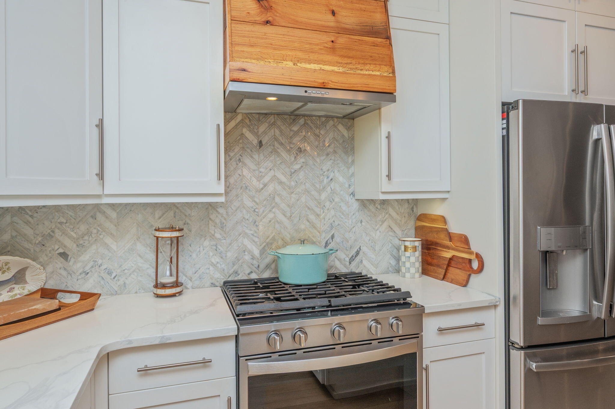 903 Lido Circle East Niceville, FL 32578 - Photo 13 of 64 a kitchen with stainless steel appliances granite countertop a stove and a refrigerator