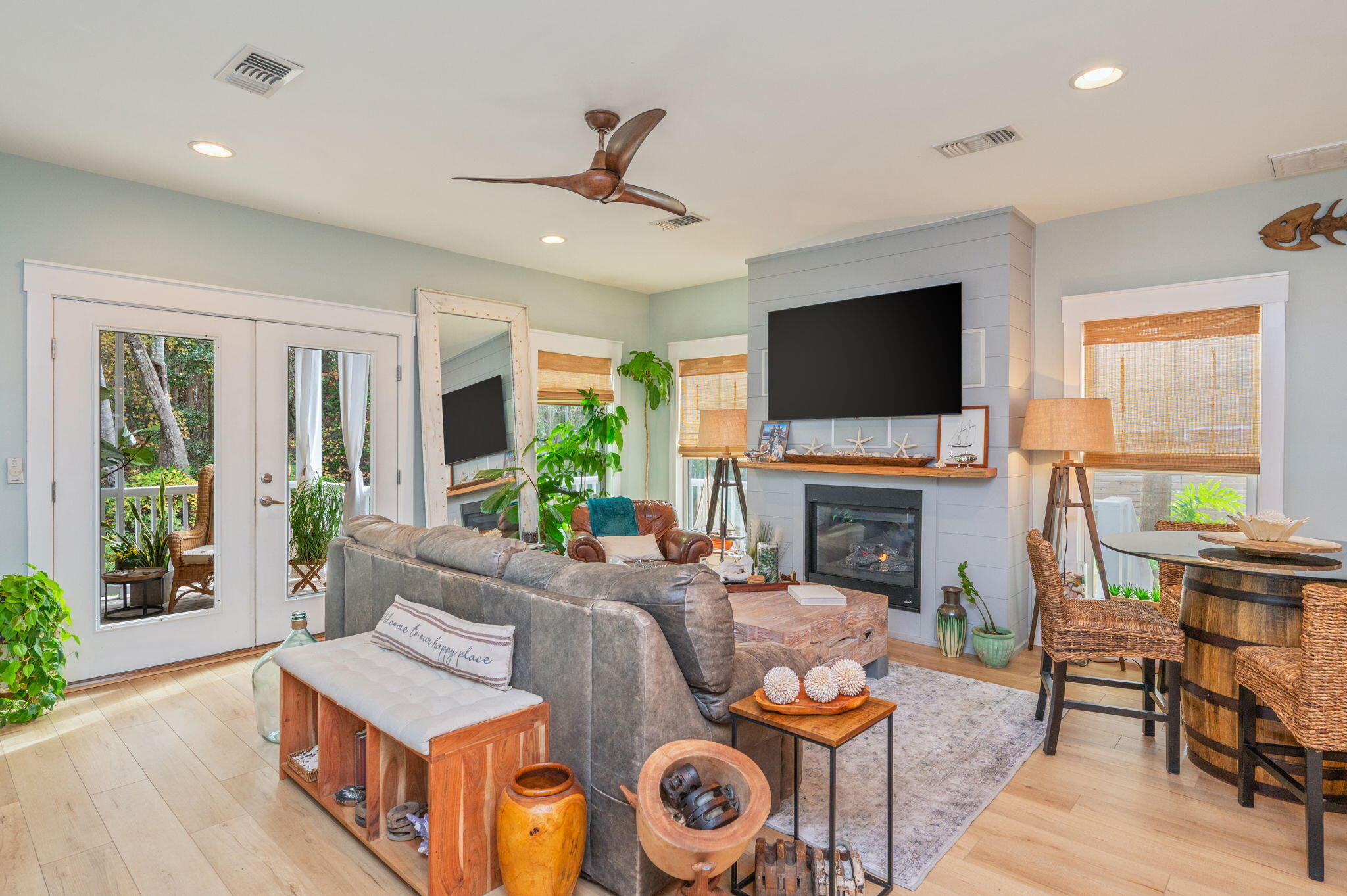 903 Lido Circle East Niceville, FL 32578 - Photo 17 of 64 a living room with fireplace furniture and a flat screen tv