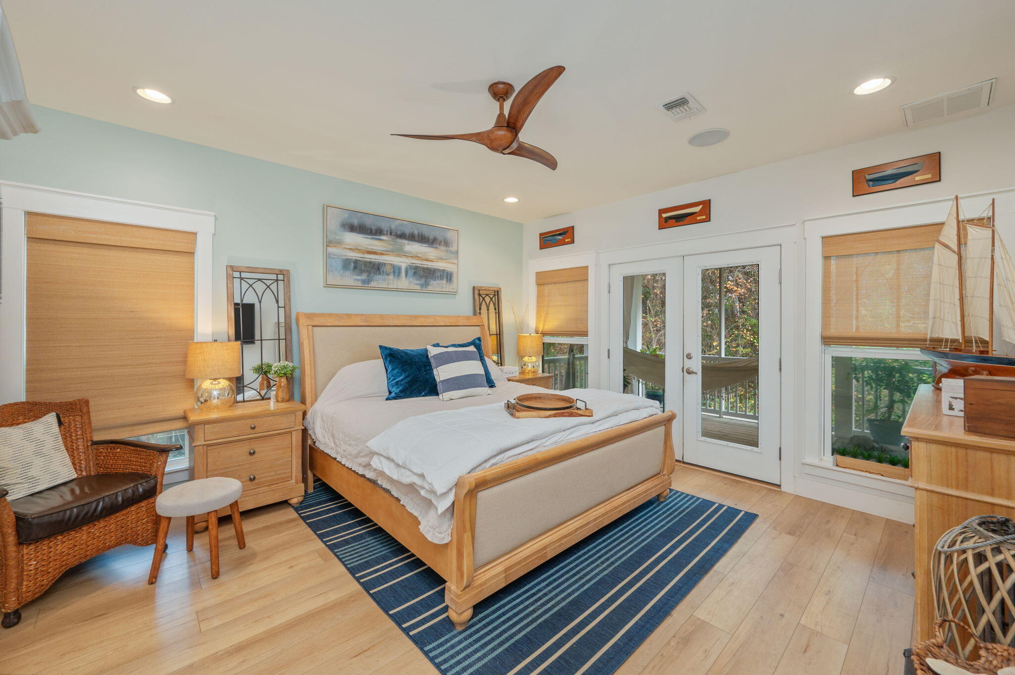 903 Lido Circle East Niceville, FL 32578 - Photo 20 of 64 a bedroom with a bed and wooden floor