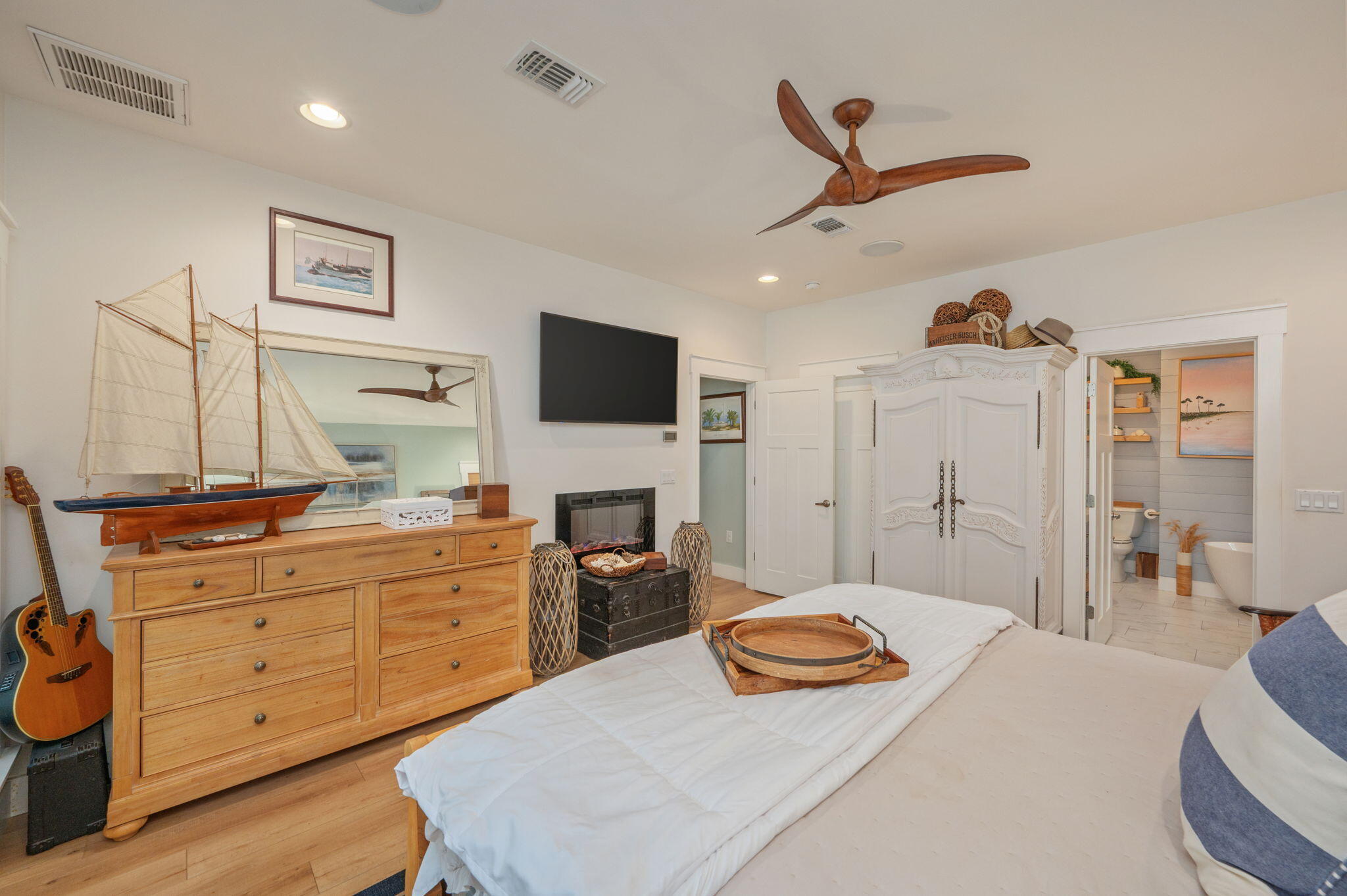 903 Lido Circle East Niceville, FL 32578 - Photo 21 of 64 a bedroom with a bed and furniture