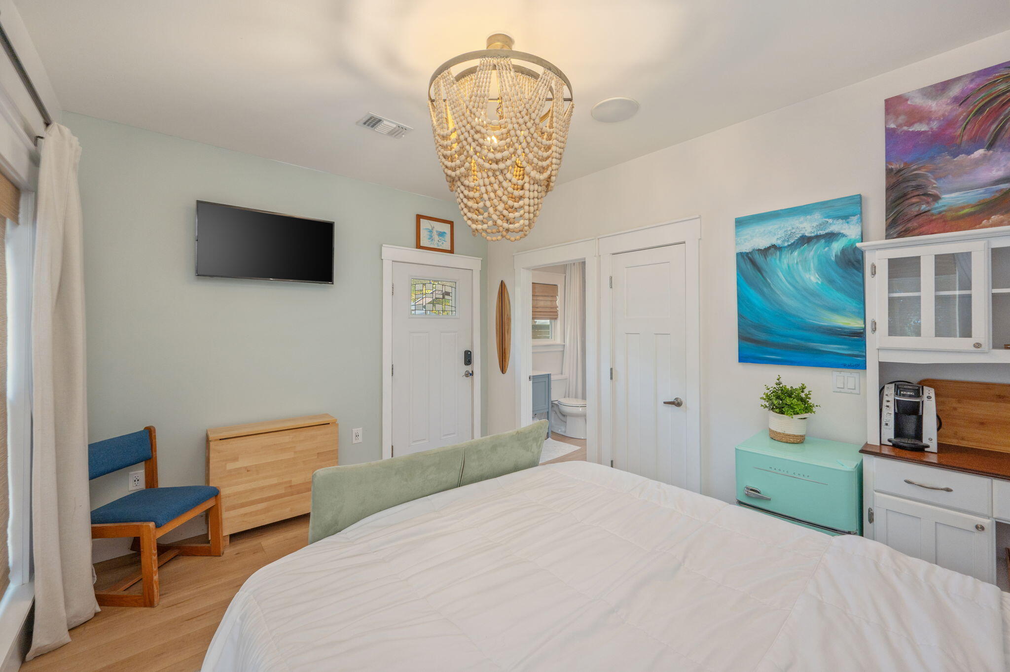 903 Lido Circle East Niceville, FL 32578 - Photo 46 of 64 a bedroom with a bed a computer on desk and a lamp on dresser