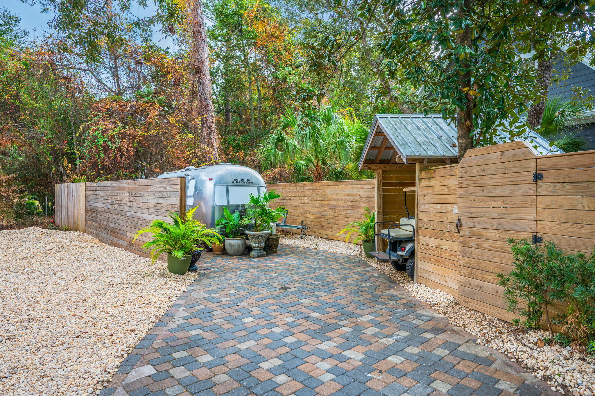 903 Lido Circle East Niceville, FL 32578 - Photo 51 of 64 a backyard of a house with a garden