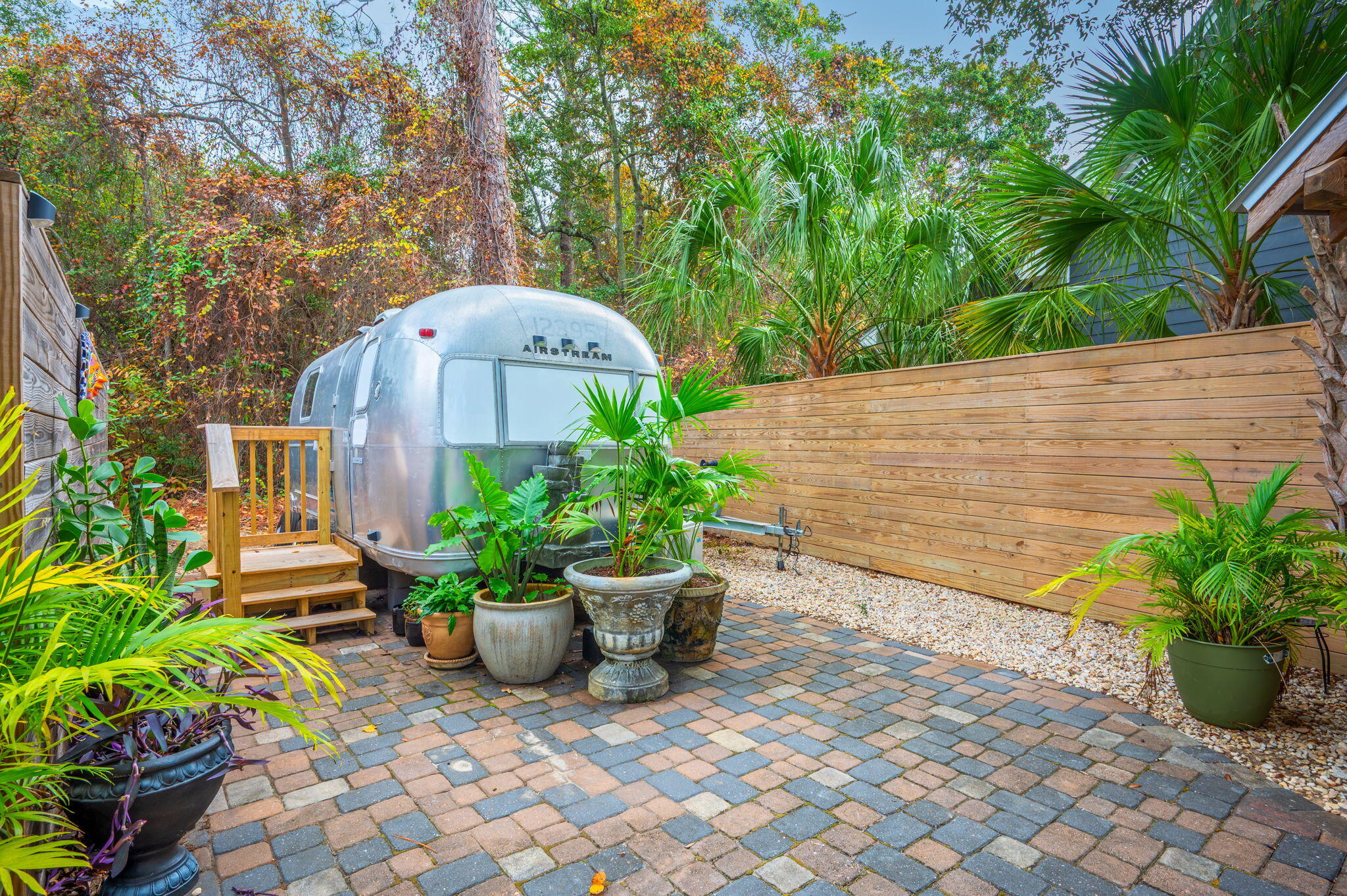 903 Lido Circle East Niceville, FL 32578 - Photo 52 of 64 a view of a garden with potted plants