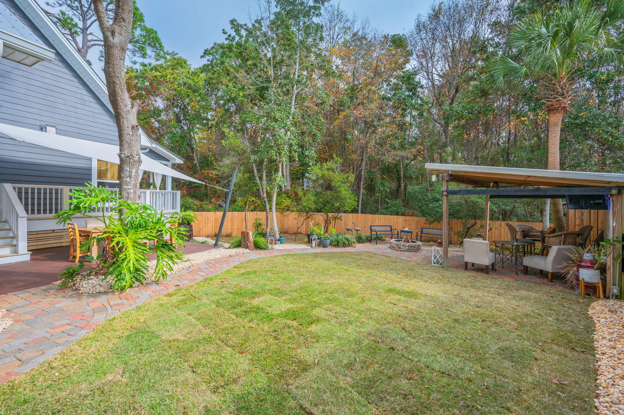 903 Lido Circle East Niceville, FL 32578 - Photo 55 of 64 a view of a house with backyard and sitting area