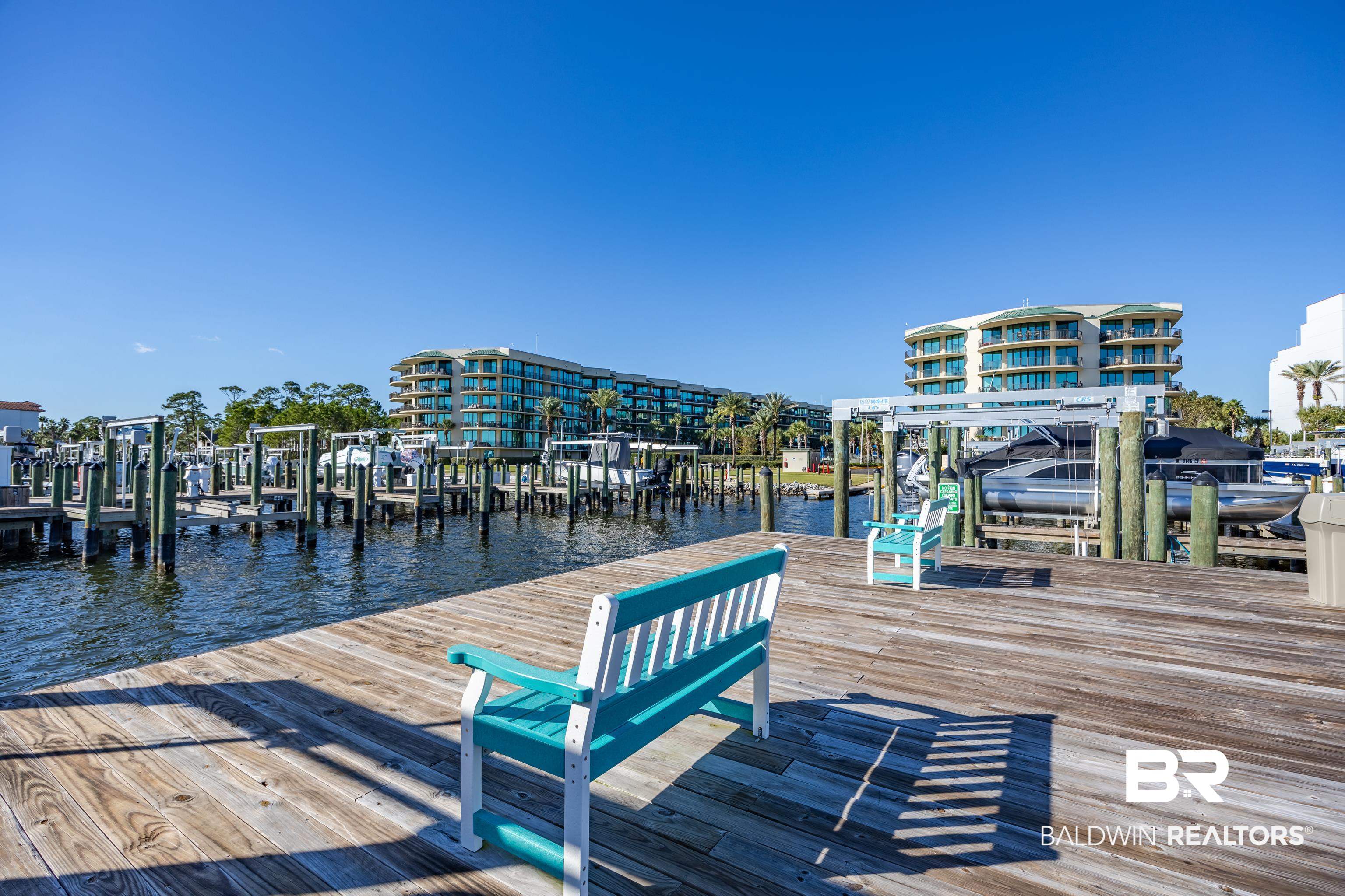 27580 Canal Road, Unit 1431 Orange Beach, AL 36561 - Photo 54 of 73 Dock featuring boat lift and a water view