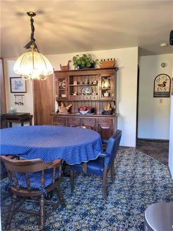 a view of a livingroom with furniture window and wooden floor