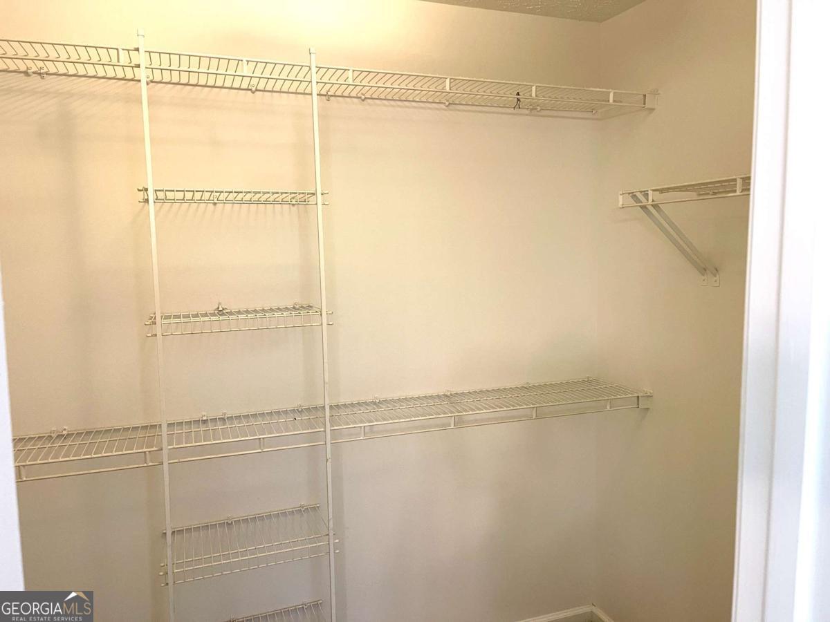 215 Mountain Ridge Covington, GA 30016 - Photo 21 of 23 a bathroom with a shower