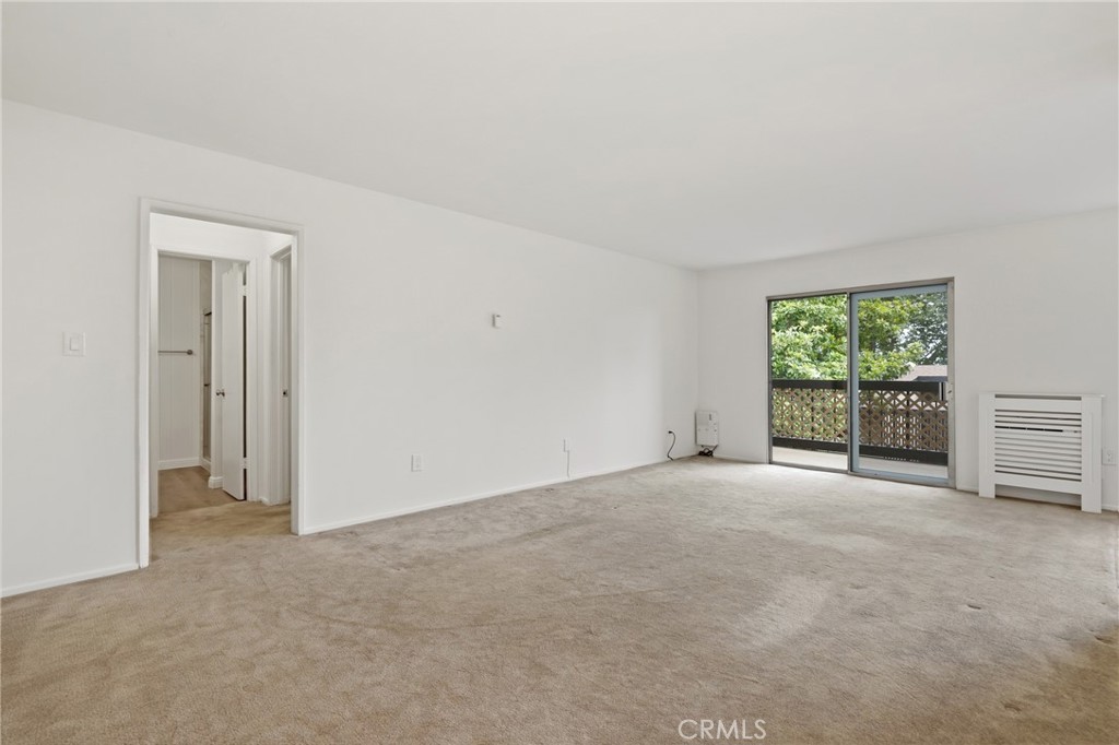 12200 Montecito Road, Unit D301 Seal Beach, CA 90740 - Photo 3 of 28 a view of an empty room with a window
