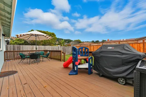 a view of furniture in wooden floor
