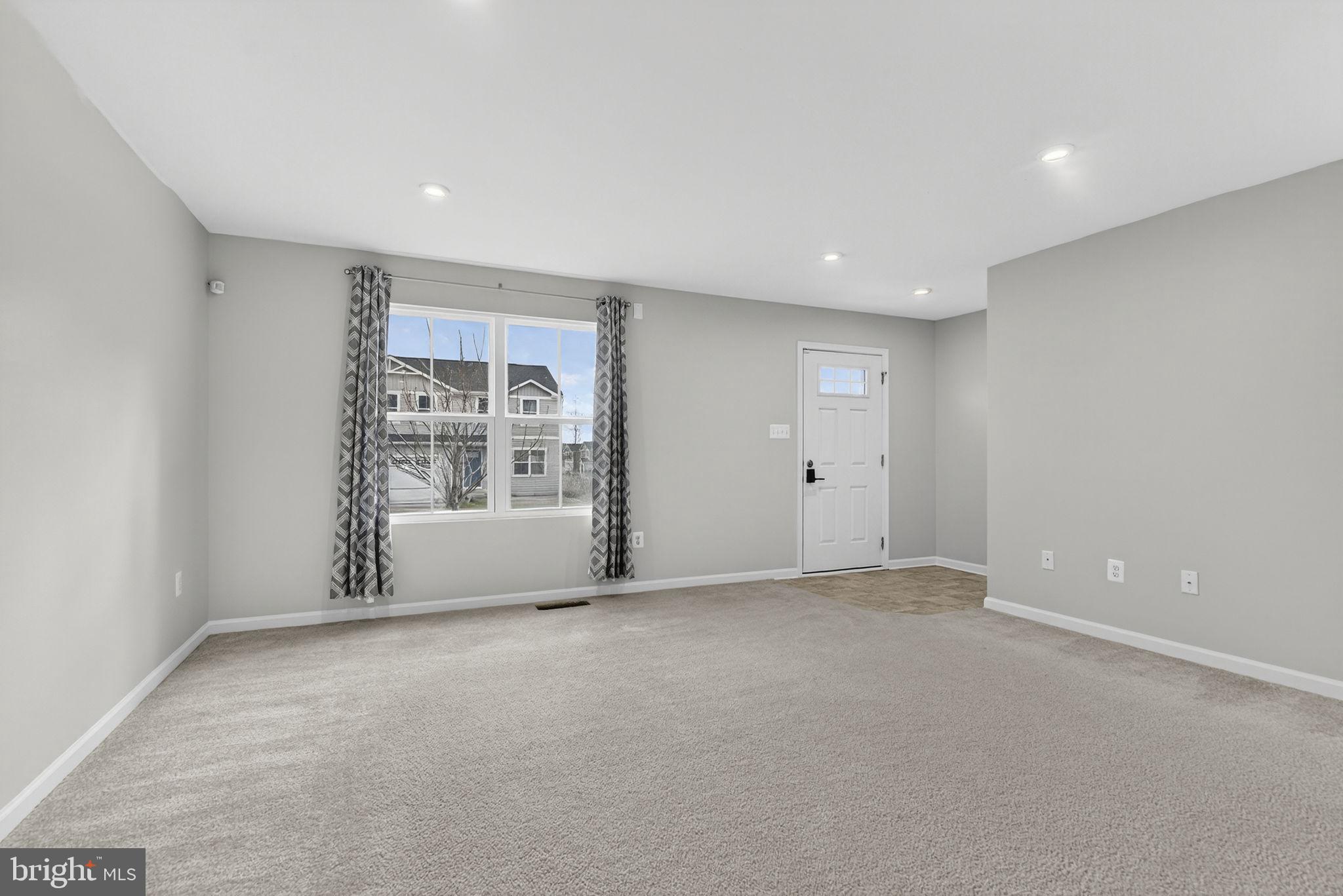 129 Birmingham Drive Middletown, VA 22645 - Photo 17 of 55 a view of an empty room with a window