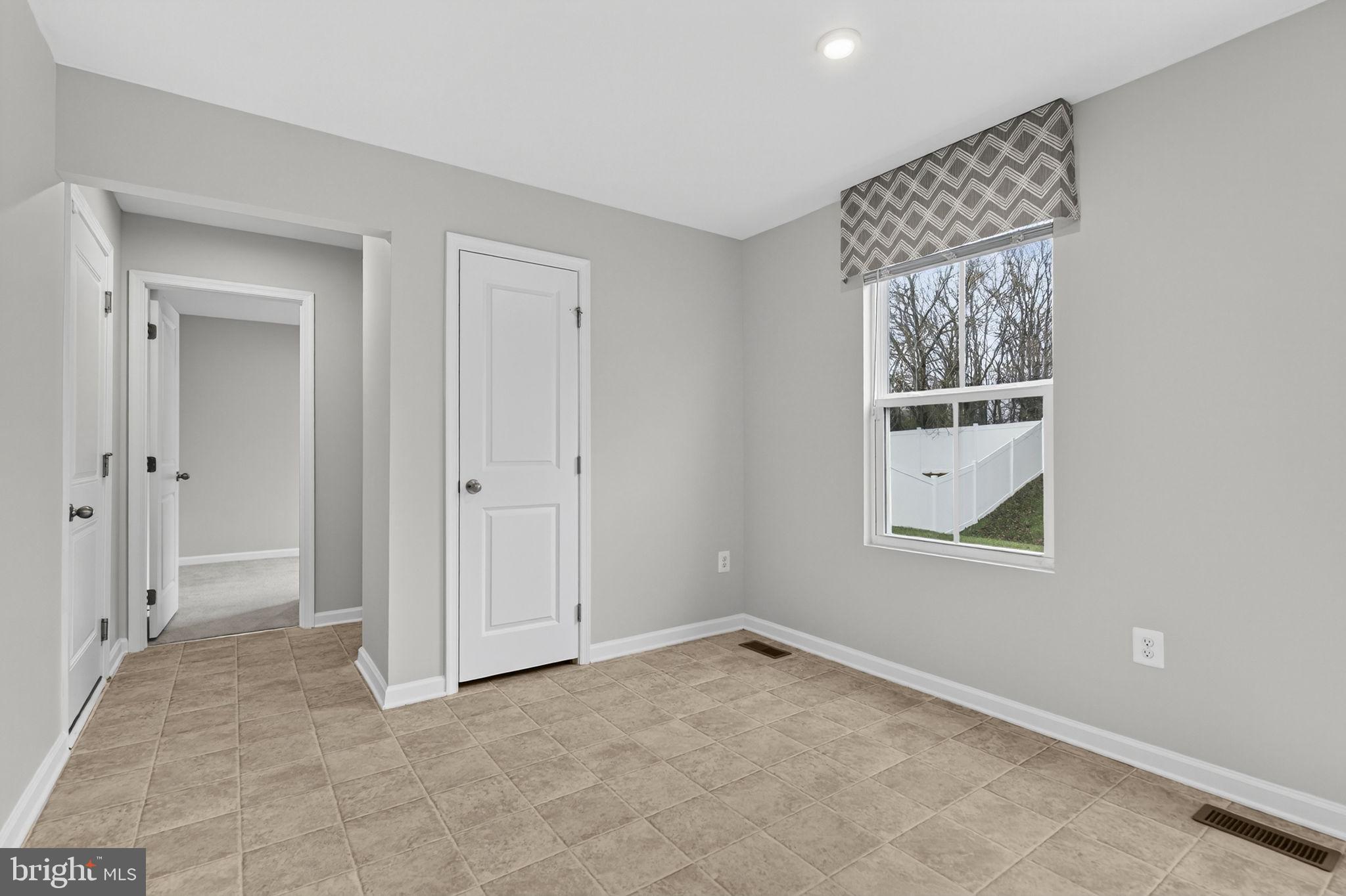 129 Birmingham Drive Middletown, VA 22645 - Photo 26 of 55 an empty room with windows and closet
