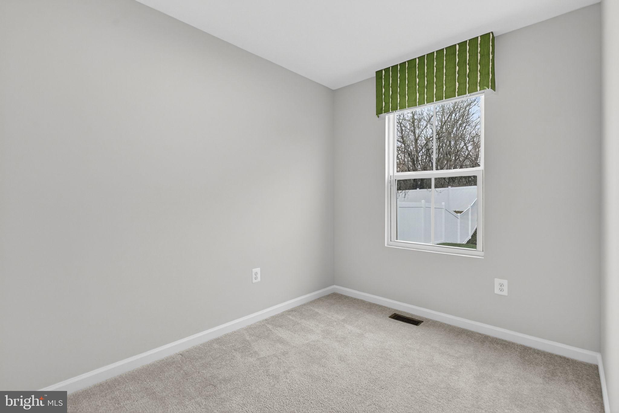 129 Birmingham Drive Middletown, VA 22645 - Photo 28 of 55 an empty room with a window