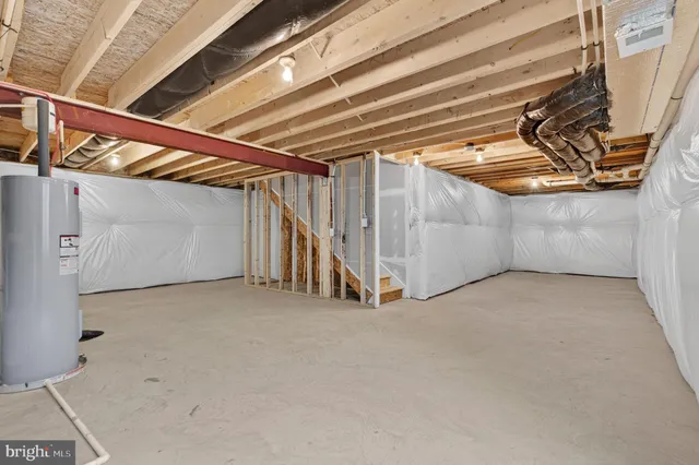 a view of a backyard with potted plants
