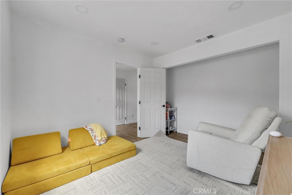 175 Paperbirch Circle Corona, CA 92881 - Photo 21 of 28 a bedroom with a couch and a couch