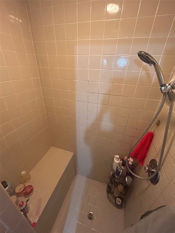 2813 1/2 Rio Grande Street, Unit 7 Austin, TX 78701 - Photo 8 of 11 a bathroom with a sink and a shower