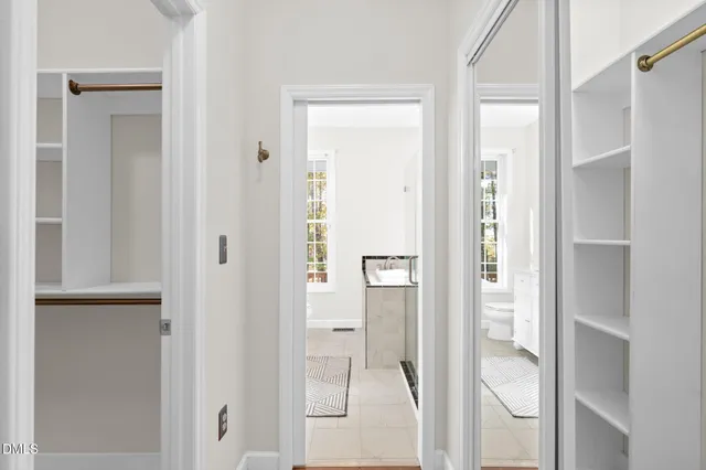 a view of an empty walk in closet