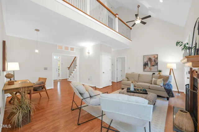 a kitchen with granite countertop a sink a counter top space and cabinets