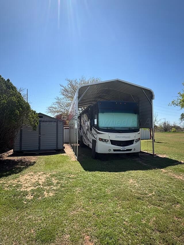 310 County Road KC Childress, TX 79201 - Photo 12 of 25 a car parked in front of a house