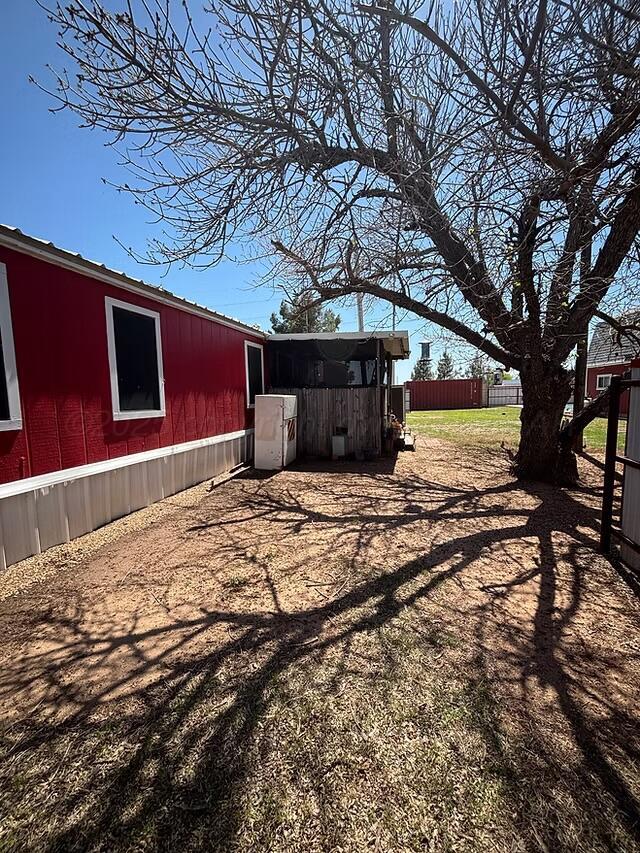 310 County Road KC Childress, TX 79201 - Photo 2 of 25 a front view of a house with a yard