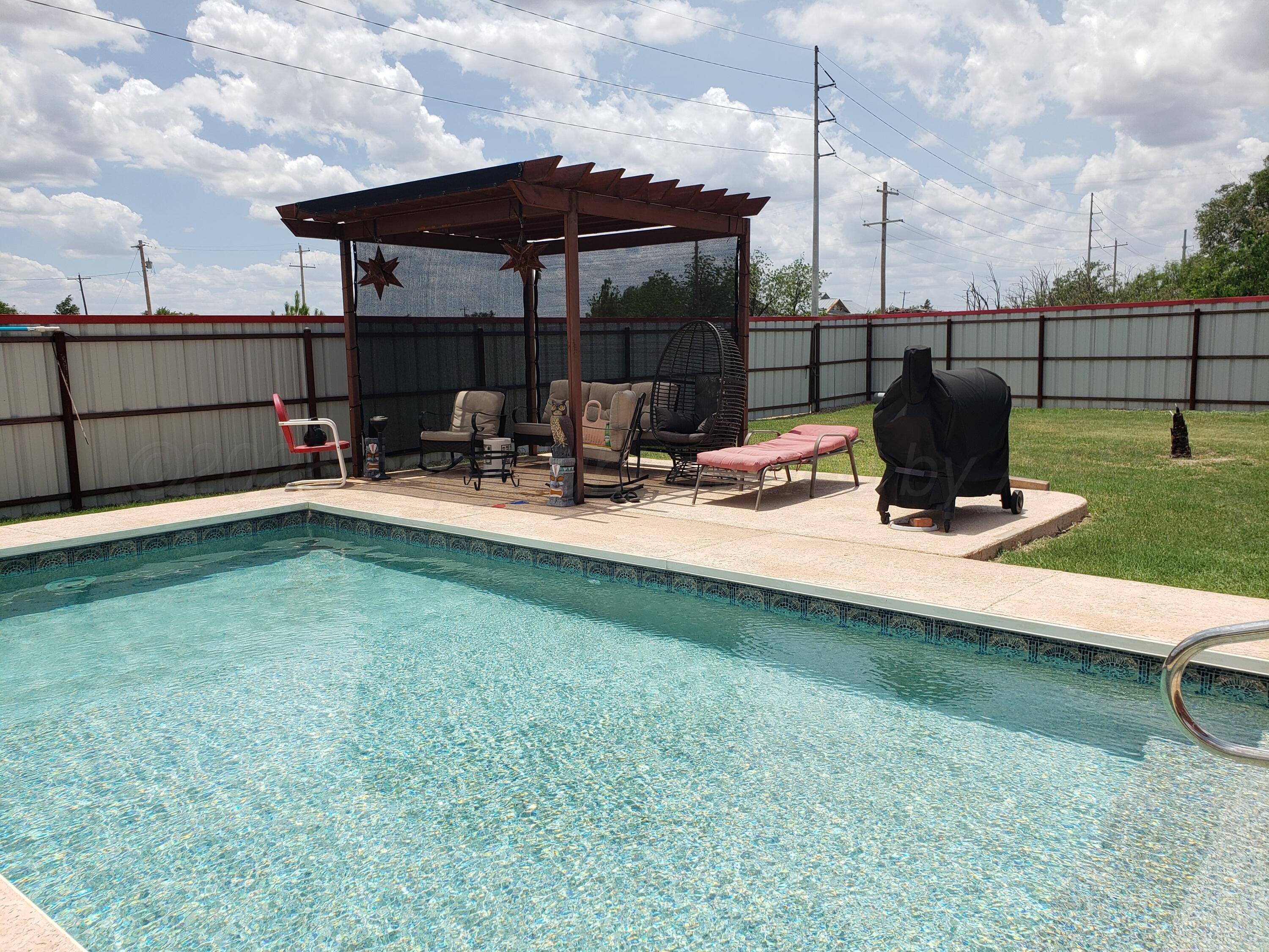 310 County Road KC Childress, TX 79201 - Photo 8 of 25 a view of a backyard with sitting area