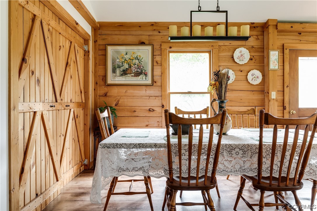 4895 Old Fredericksburg Road Mineral, VA 23117 - Photo 16 of 39 a view of a very nice looking dining room with furniture window and wooden floor