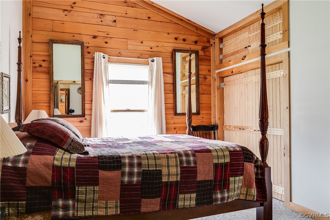 4895 Old Fredericksburg Road Mineral, VA 23117 - Photo 19 of 39 a bedroom with a bed and wooden floor