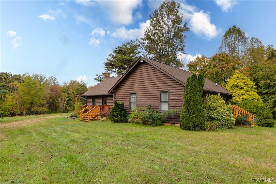 4895 Old Fredericksburg Road Mineral, VA 23117 - Photo 29 of 39 a view of backyard of house with green space